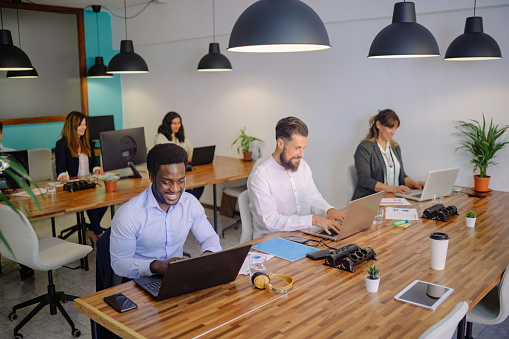 Atlas Logistics team collaborating in a modern office